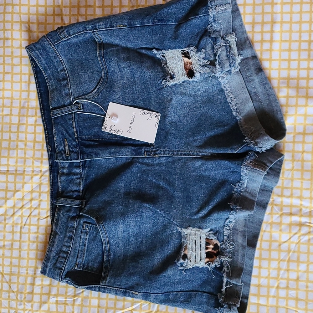 High Waisted Jean Shorts with leopard print under rips